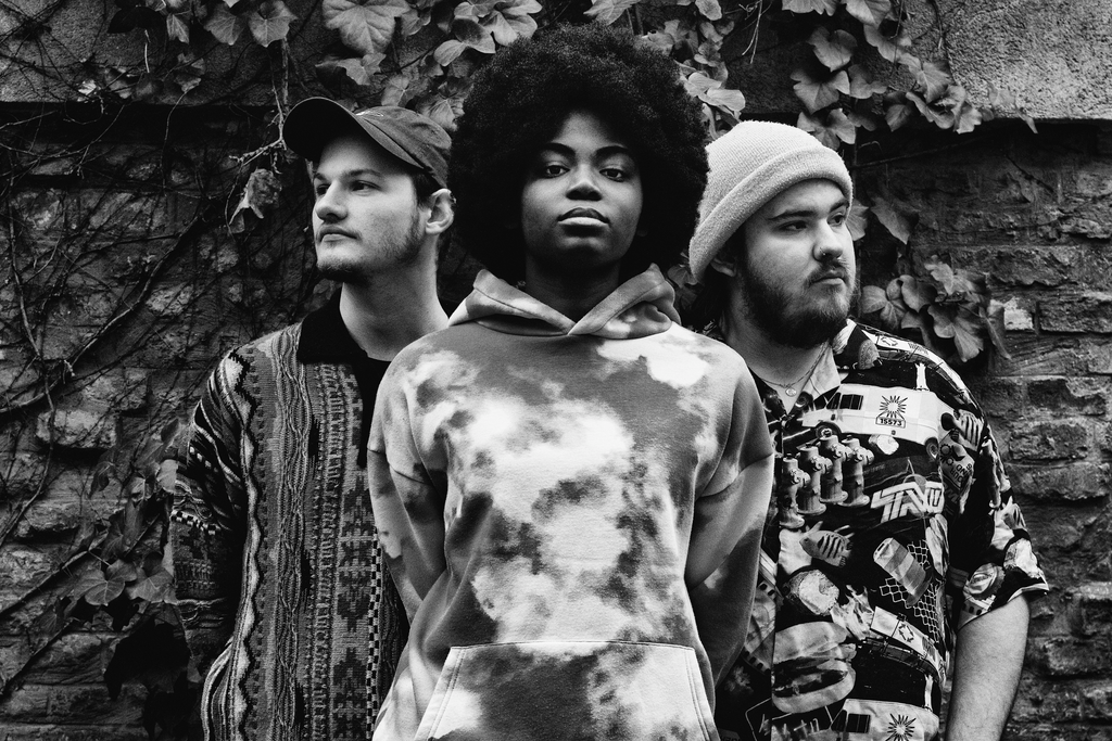 Black and white band photograph of Curb.