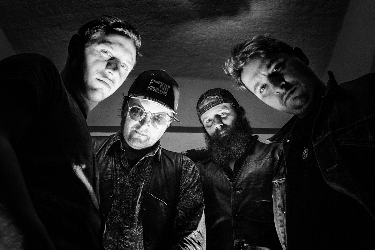 Black and white photograph of the band Hangover Division.